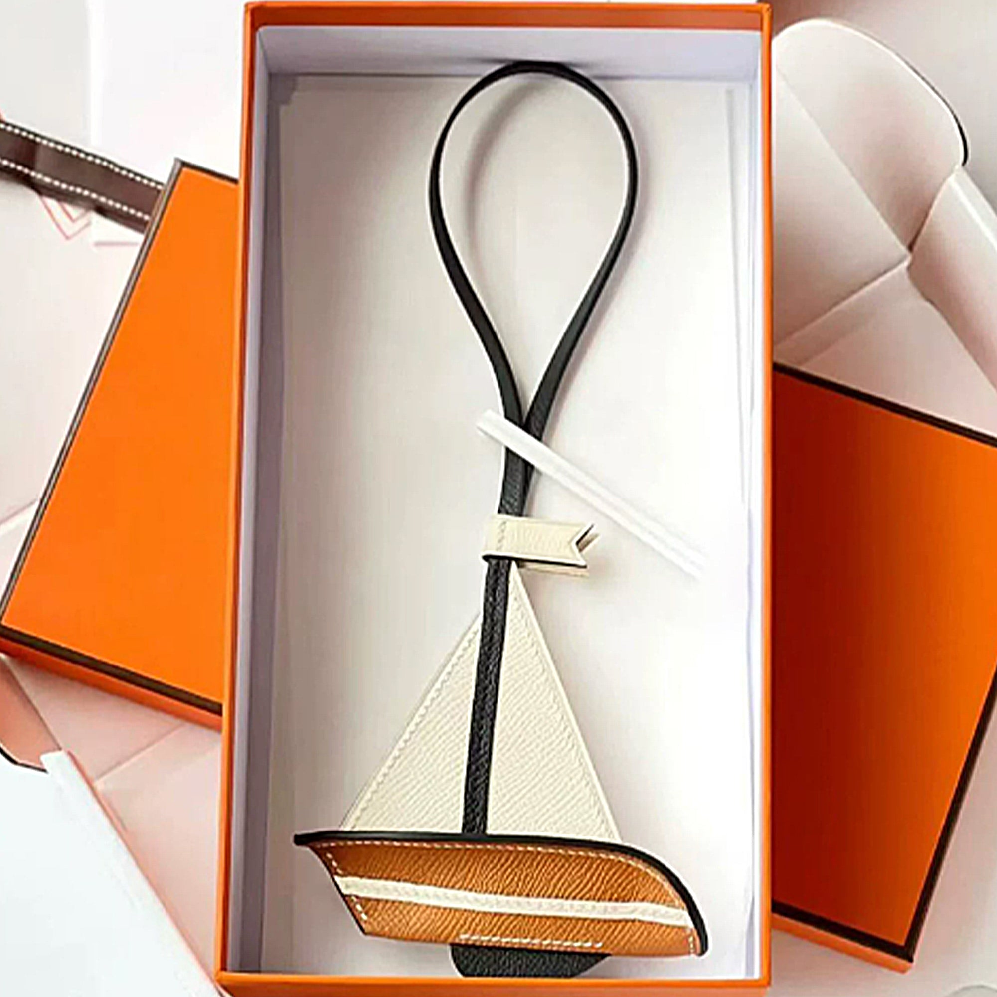 Handmade genuine leather sailboat pendant, universal hanging accessories for cars, bags, luggage, and good luck amulets as gifts